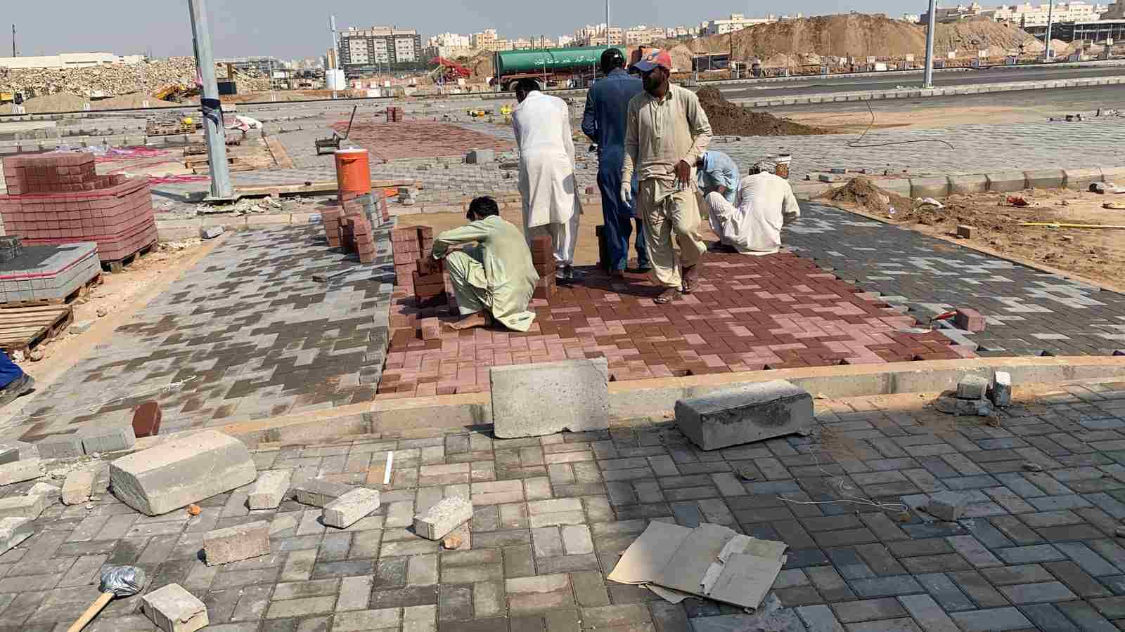 أعمال طرق وأرصفة وإنارة — 12
